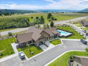 an aerial view of a house with a pool at Yellowstone Yonder Red Lodge in Red Lodge