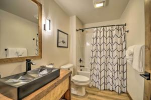 a bathroom with a sink and a toilet and a shower at Hauser House Unit 1 in Red Lodge +29 photos
