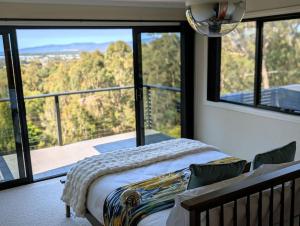 Ένα ή περισσότερα κρεβάτια σε δωμάτιο στο Panorama Escape, Port Sorell