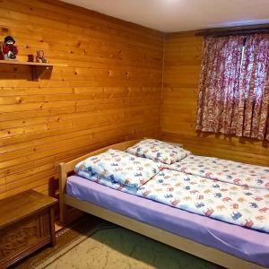 Giường trong phòng chung tại Vikendica Zora Jahorina +8 ảnh