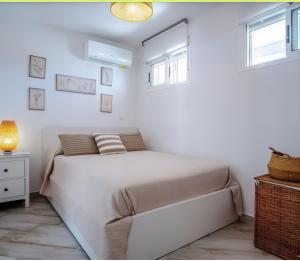 Ένα ή περισσότερα κρεβάτια σε δωμάτιο στο Luz de Doñana