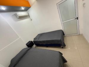 Postel nebo postele na pokoji v ubytování Departamento Rojas 1