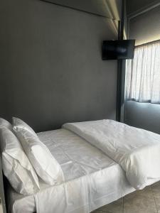 Ένα ή περισσότερα κρεβάτια σε δωμάτιο στο Letsios Steel2