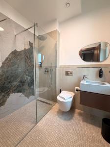 Et badeværelse på Amaroo - Apartments "Regia"