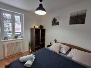 Ένα ή περισσότερα κρεβάτια σε δωμάτιο στο Residence Bella