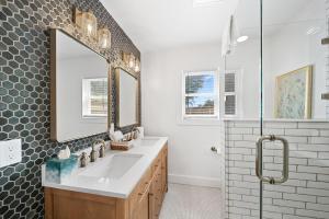 a bathroom with a sink and a mirror at The Pink House in Banner Elk +32 photos