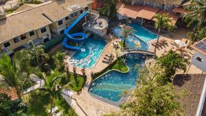 Bazén v ubytování Ramada by Wyndham Porto Seguro Praia nebo v jeho okolí