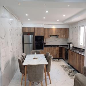 Η κουζίνα ή μικρή κουζίνα στο F3 Cosy neuf 2 chambres 5 pers