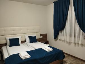 Postel nebo postele na pokoji v ubytování Странската изба град Калофер + 6 fotografií