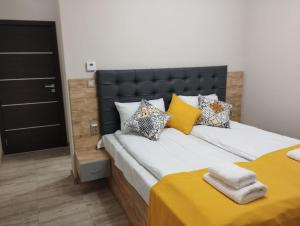 Postel nebo postele na pokoji v ubytování Странската изба град Калофер