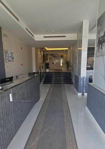Ο χώρος του λόμπι ή της ρεσεψιόν στο شقق منازل العروبة للشقق المخدومة