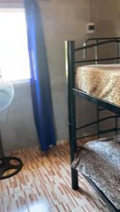 Ένα ή περισσότερα κρεβάτια σε δωμάτιο στο Dulce Azul +1 φωτογραφίες