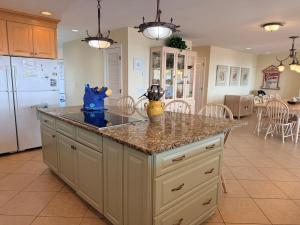 Kuchyň nebo kuchyňský kout v ubytování Majak Moments