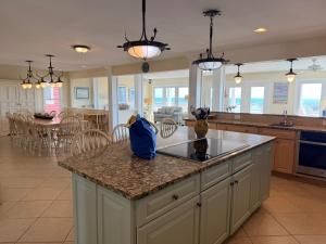 Kuchyň nebo kuchyňský kout v ubytování Majak Moments