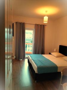 Postel nebo postele na pokoji v ubytování Hotel Miranda & Miranda