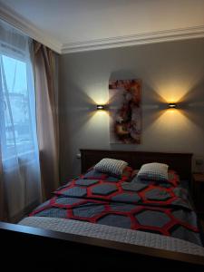 Ένα ή περισσότερα κρεβάτια σε δωμάτιο στο Apartament Prestige Zawiercie