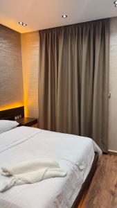 Postel nebo postele na pokoji v ubytování Suite Bahiya unica