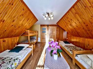 Postel nebo postele na pokoji v ubytování U Zosi + 99 fotografií