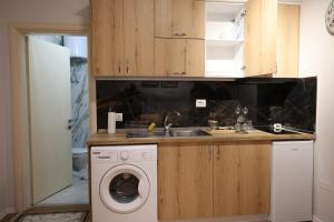 Η κουζίνα ή μικρή κουζίνα στο Home 3