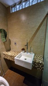 Vannituba majutusasutuses Tranquility and leisure in an admirable city