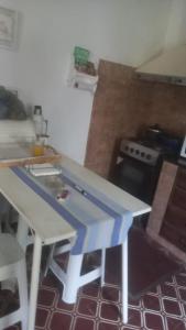 O bucătărie sau chicinetă la Alojamiento Luisito