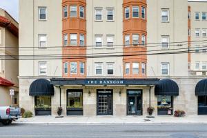 a building on a street with a pharmacy at Walk to Beach and Music Pier! Condo in Ocean City in Ocean City