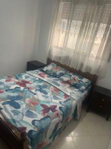 Ένα ή περισσότερα κρεβάτια σε δωμάτιο στο Ketama