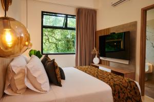 TV/trung tâm giải trí tại Casa Noral Hotel