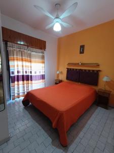 Postel nebo postele na pokoji v ubytování Complejo Las Toninas