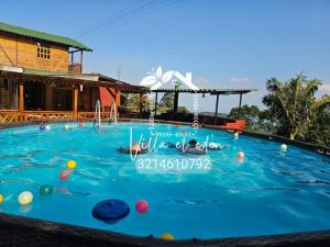 Бассейн в Glamping y Cabañas SPLENDOR VILLA EL EDEN или поблизости