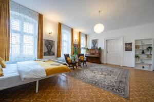 En eller flere senge i et værelse på BOHO Flat Brașov