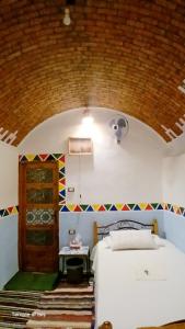 Ένα ή περισσότερα κρεβάτια σε δωμάτιο στο Nubian Dreams Heissa