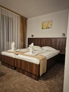 Ένα ή περισσότερα κρεβάτια σε δωμάτιο στο Hotel Claris +61 φωτογραφίες