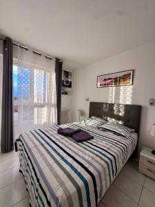Llit o llits en una habitació de O'KANEDO