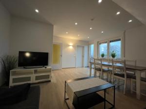 Μια τηλεόραση ή/και κέντρο ψυχαγωγίας στο HörnQuartier - modern eingerichtete Ferienwohnung - Familienfreundlich, ideal auch für Geschäftskunden