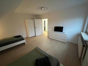 Μια τηλεόραση ή/και κέντρο ψυχαγωγίας στο HörnQuartier - modern eingerichtete Ferienwohnung - Familienfreundlich, ideal auch für Geschäftskunden