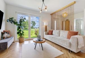 Χώρος καθιστικού στο FeWo Martini- mit Whirlpool,Terrasse und Albcard