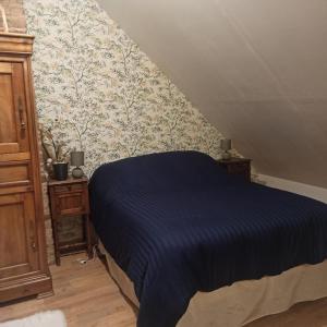 Postel nebo postele na pokoji v ubytování Le presbytère de Bueil - Gite 8 pers - 5 couchages