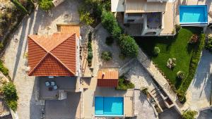 an overhead view of a house with an orange roof at Villa Petra- Panormic Sea view - Private Pool in Kalyves