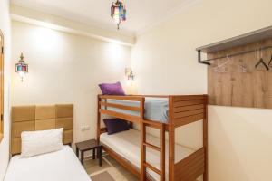 Giường trong phòng chung tại Cycas family apart ground floor parking +4 ảnh