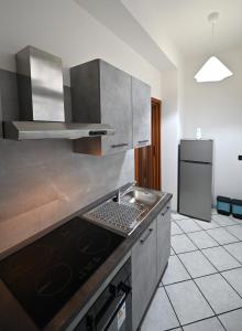 Η κουζίνα ή μικρή κουζίνα στο Il Ciclamino, a due passi dalla Reggia e dallo Stadio