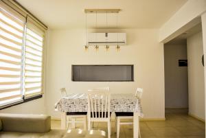 TV a/nebo společenská místnost v ubytování Apart luxe - Zona rio - Piscina!