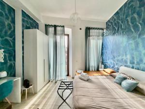 Postel nebo postele na pokoji v ubytování Affittacamere Massimo D'Azeglio