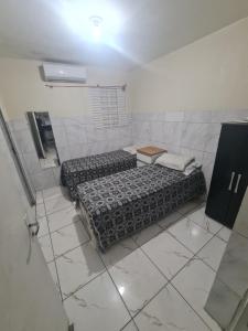 Ένα ή περισσότερα κρεβάτια σε δωμάτιο στο Elite Hotel Prime