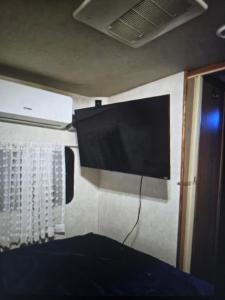 Televiisor ja/või meelelahutuskeskus majutusasutuses Isla paraiso Rv