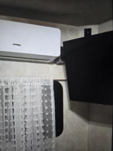 Televiisor ja/või meelelahutuskeskus majutusasutuses Isla paraiso Rv +7 fotot