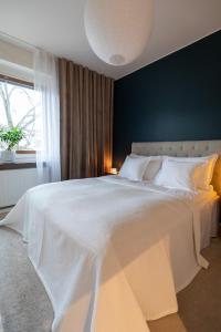 Ένα ή περισσότερα κρεβάτια σε δωμάτιο στο Tilava saunallinen kolmio