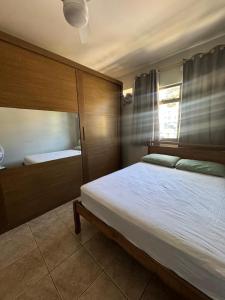 Ένα ή περισσότερα κρεβάτια σε δωμάτιο στο Apartamento verdes mares