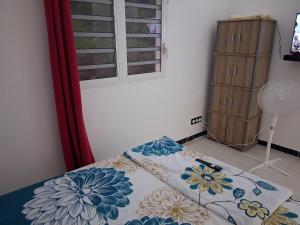 Ένα ή περισσότερα κρεβάτια σε δωμάτιο στο Sweet sapotilla