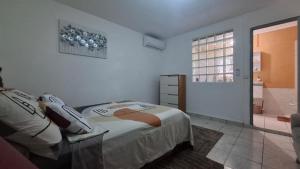 Postel nebo postele na pokoji v ubytování Oasis de Suzini